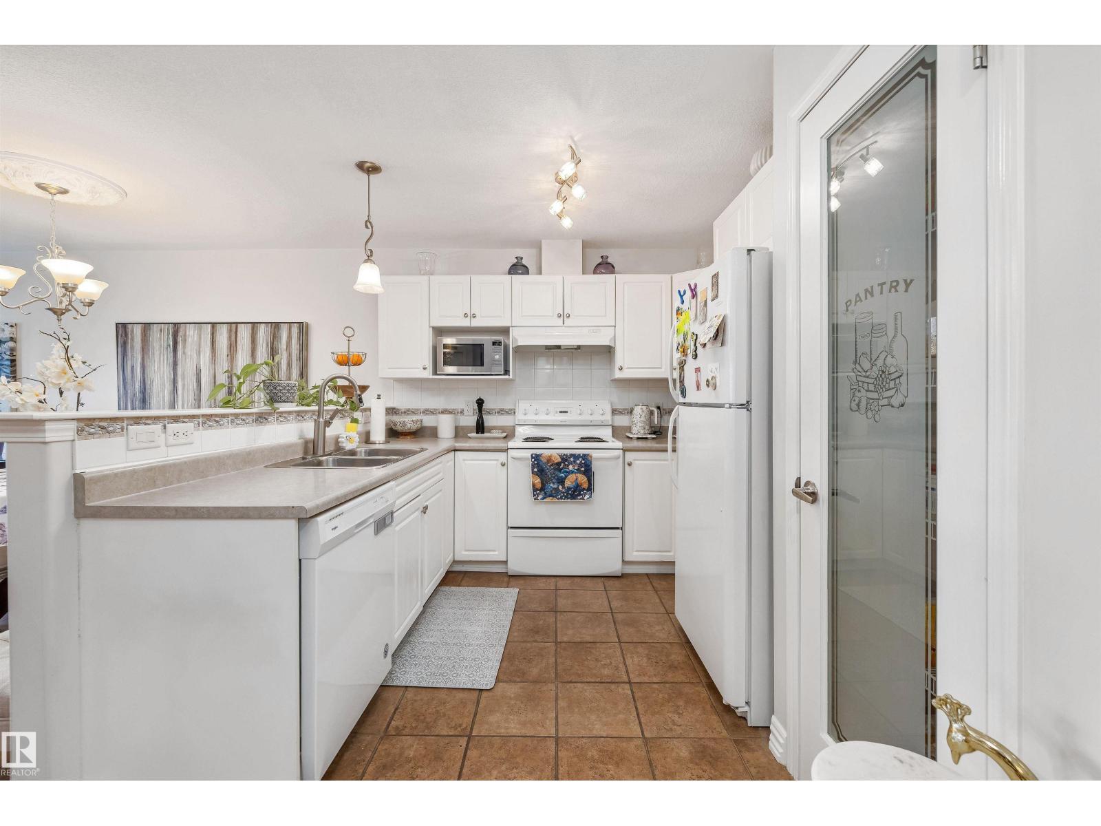 #214 237 YOUVILLE DR E NW