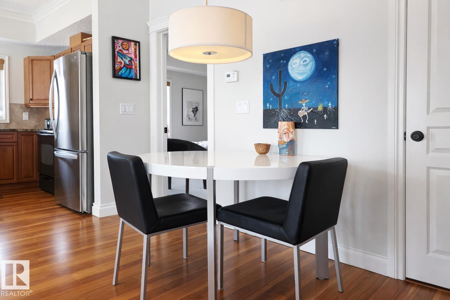 #406 10232 115 ST NW