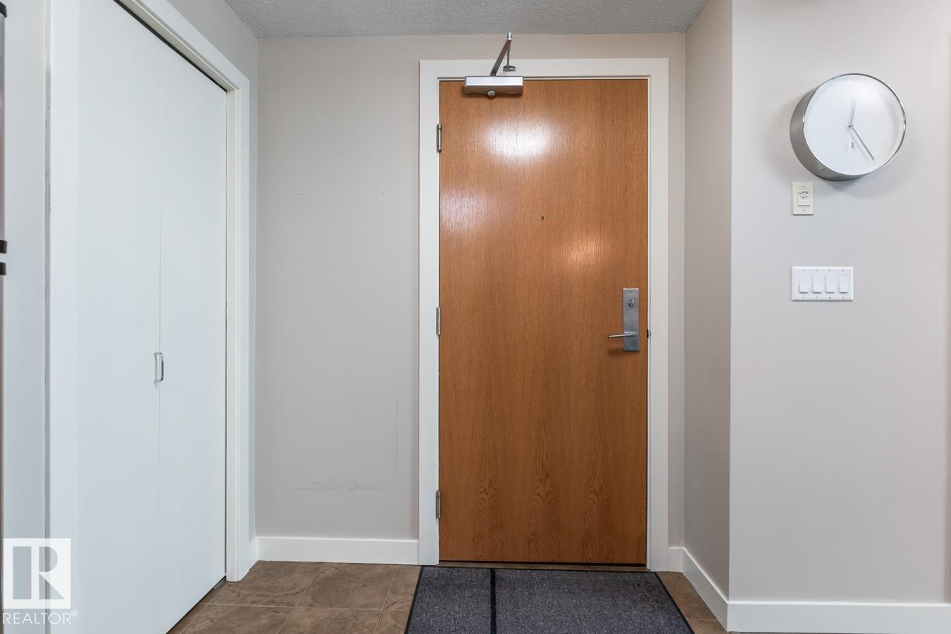 #607 10055 118 ST NW