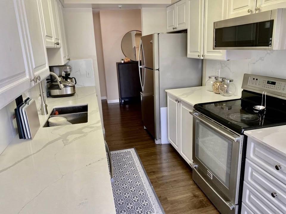 1408 9830 WHALLEY BOULEVARD