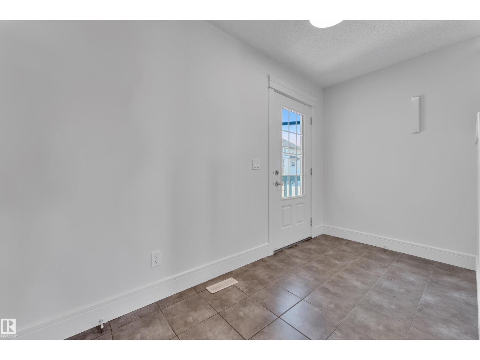 6156 11 AV SW