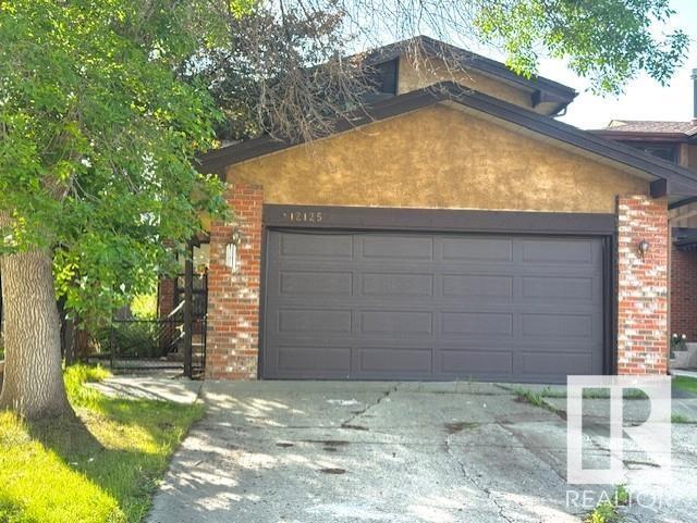 12125 25 AV NW