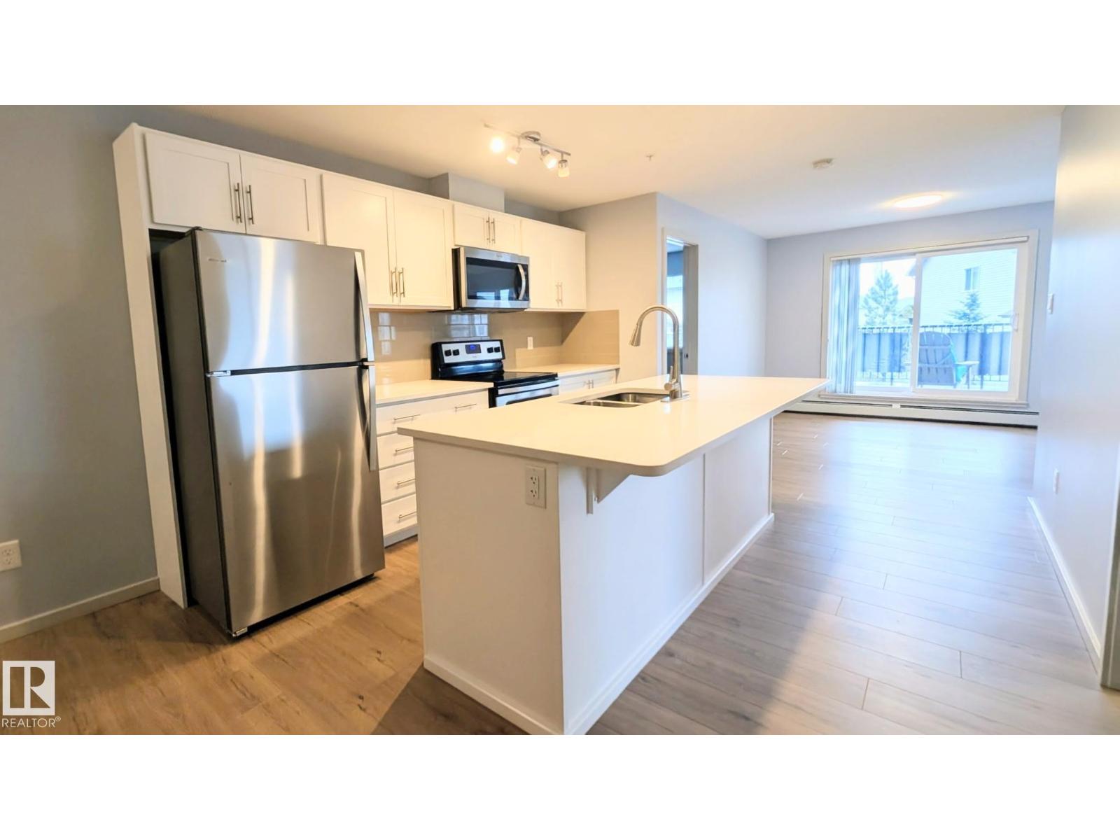 #120 5404 7 AV SW