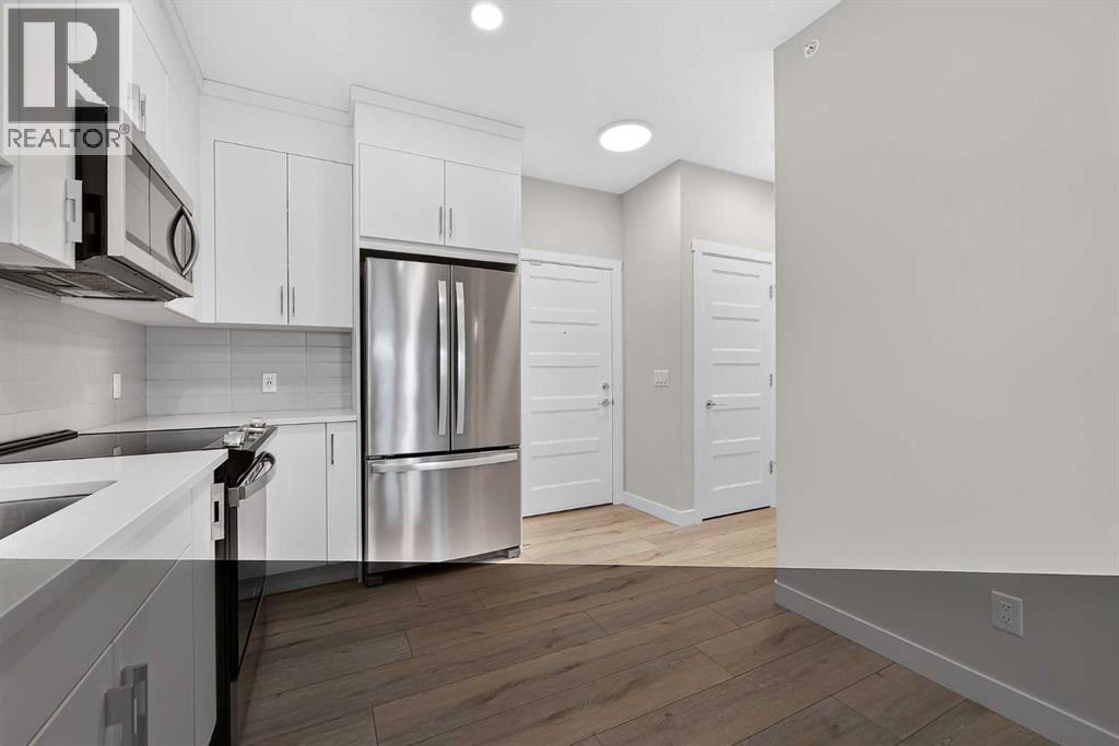 411, 55 Wolf Hollow Crescent SE