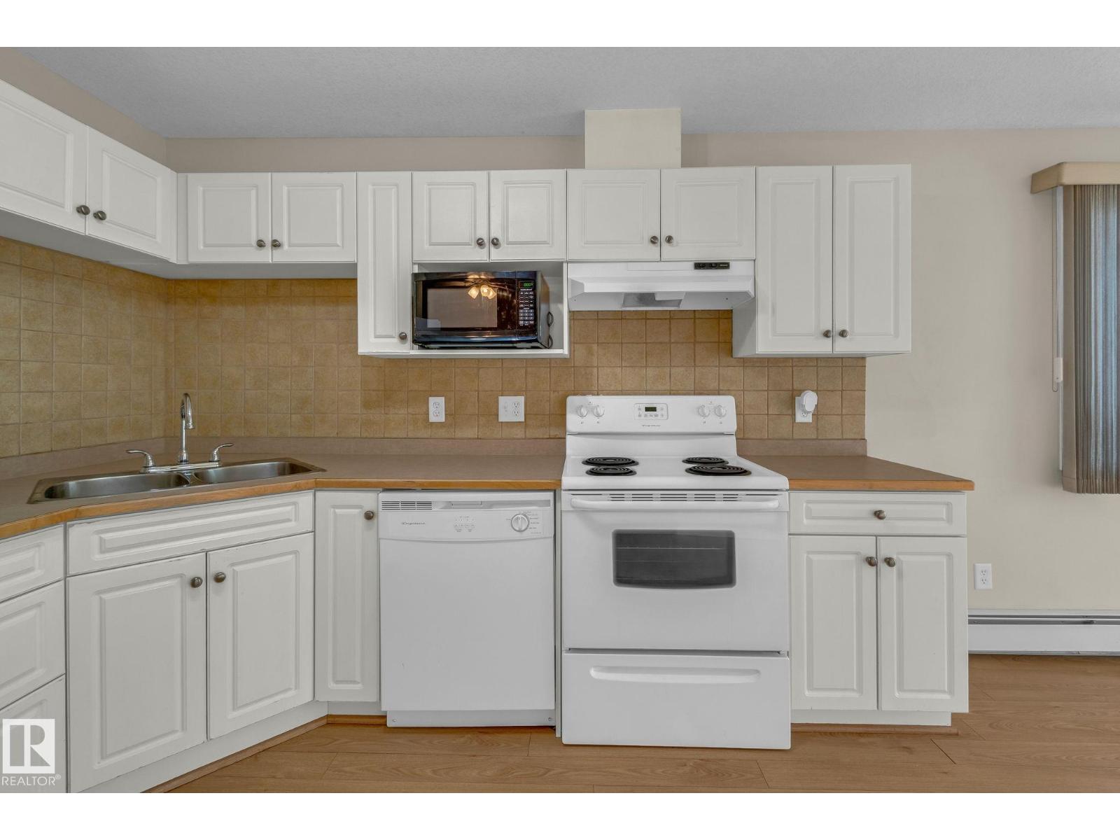 #212 12550 140 AV NW