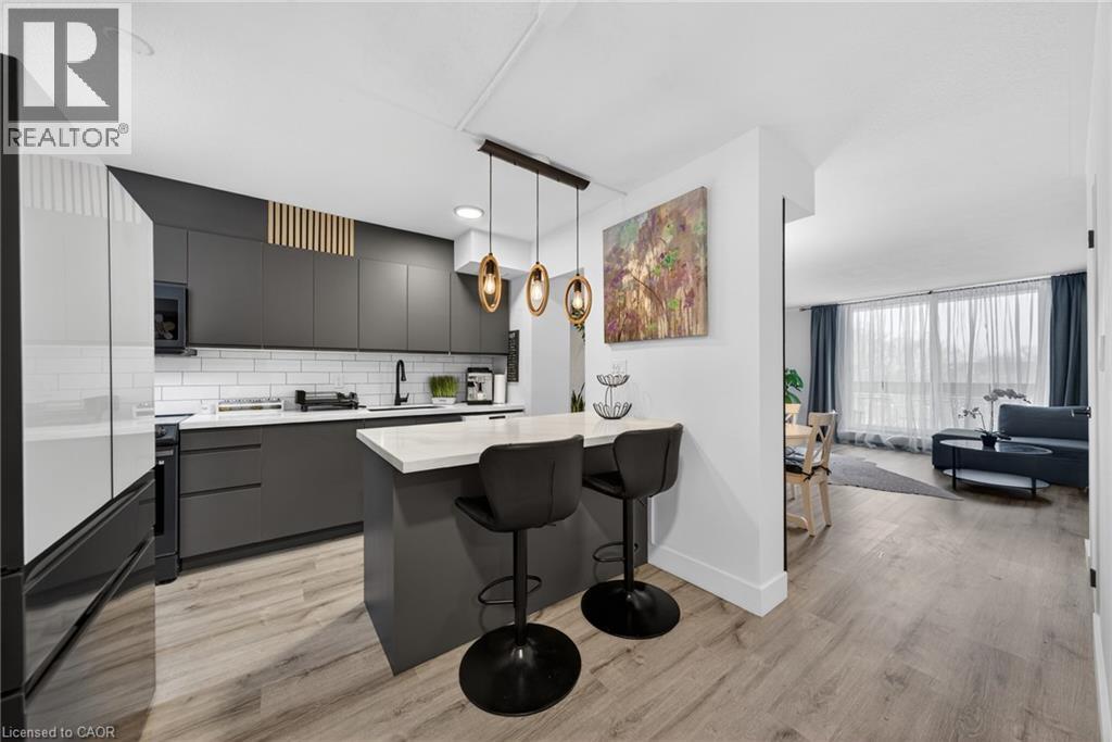 Photo 1 of 36 — 350 QUIGLEY Road Unit# 324, Hamilton, ON L8K5N2