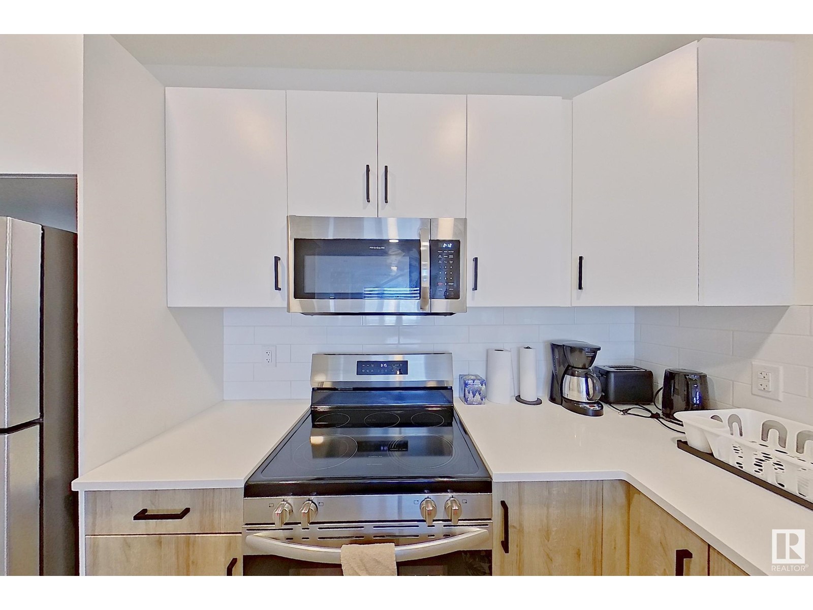 8003-5,7,9 120 AV NW