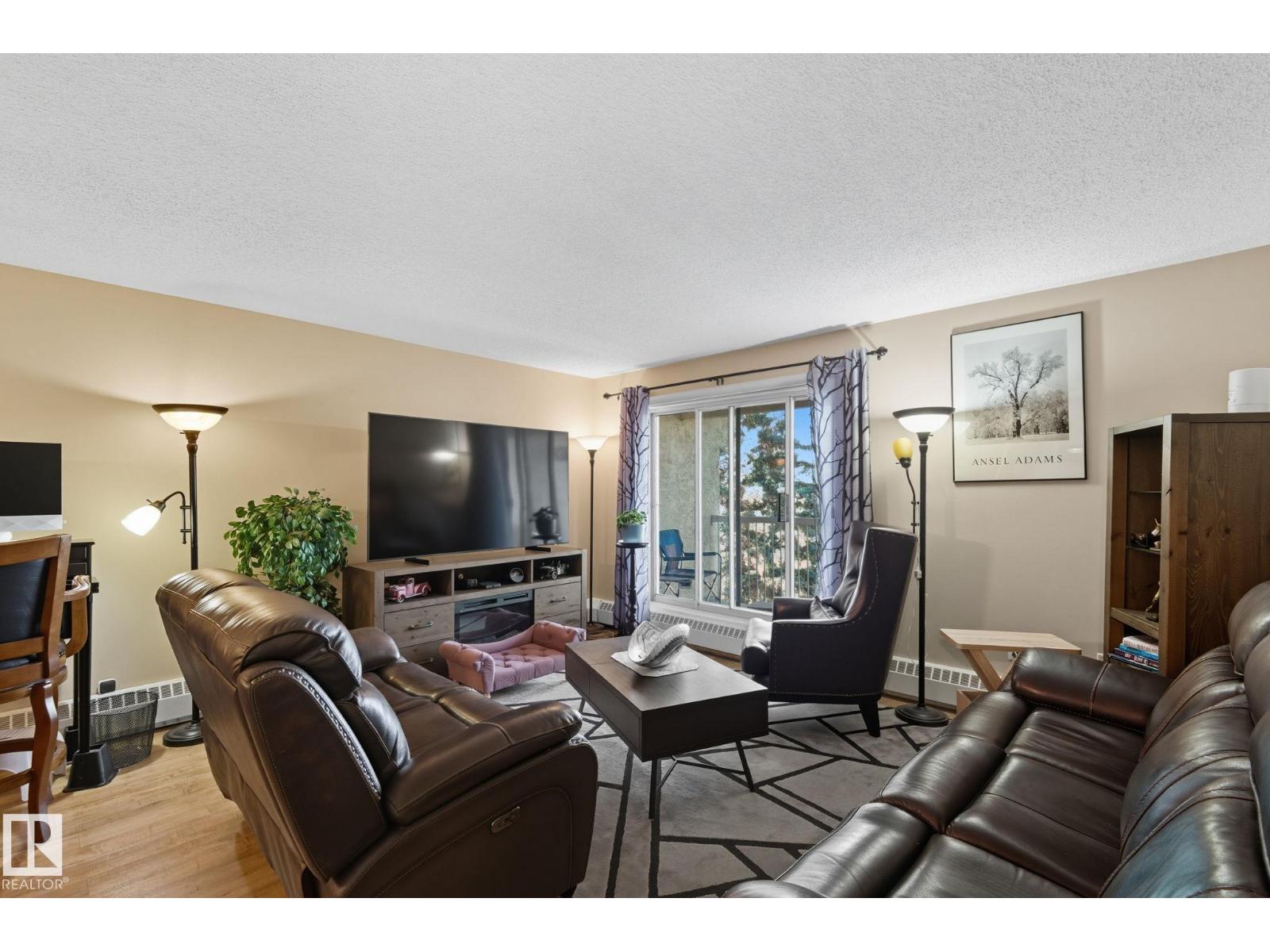 #411 18004 95 Ave NW