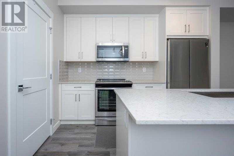 408, 10 Sage Hill NW