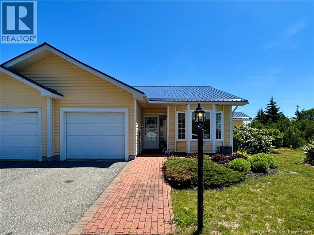 Photo 1 of 45 — 13 Ragged Point Road Unit# 1, Grand Manan, NB E5G2C1