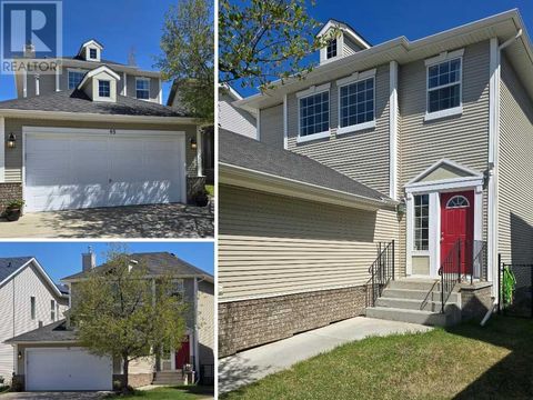 48 Cougarstone Square SW Calgary AB T3H5J3