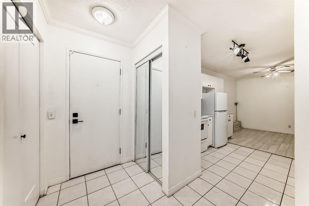 205, 626 2 Avenue NE