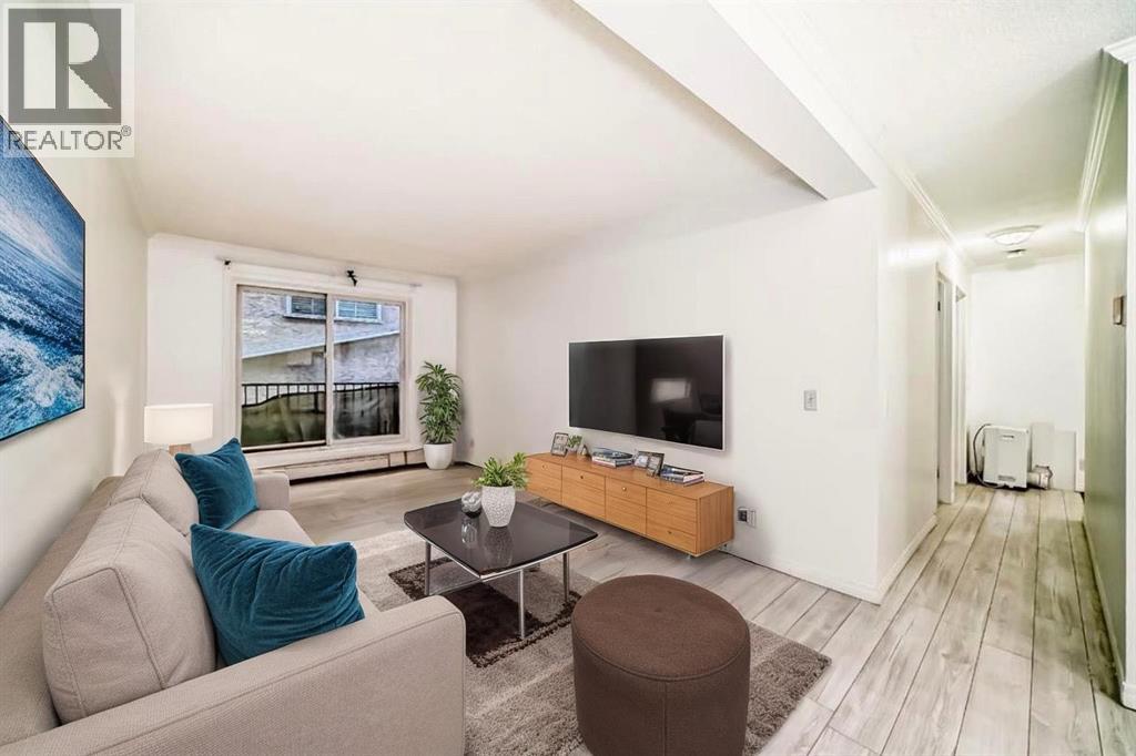 205, 626 2 Avenue NE