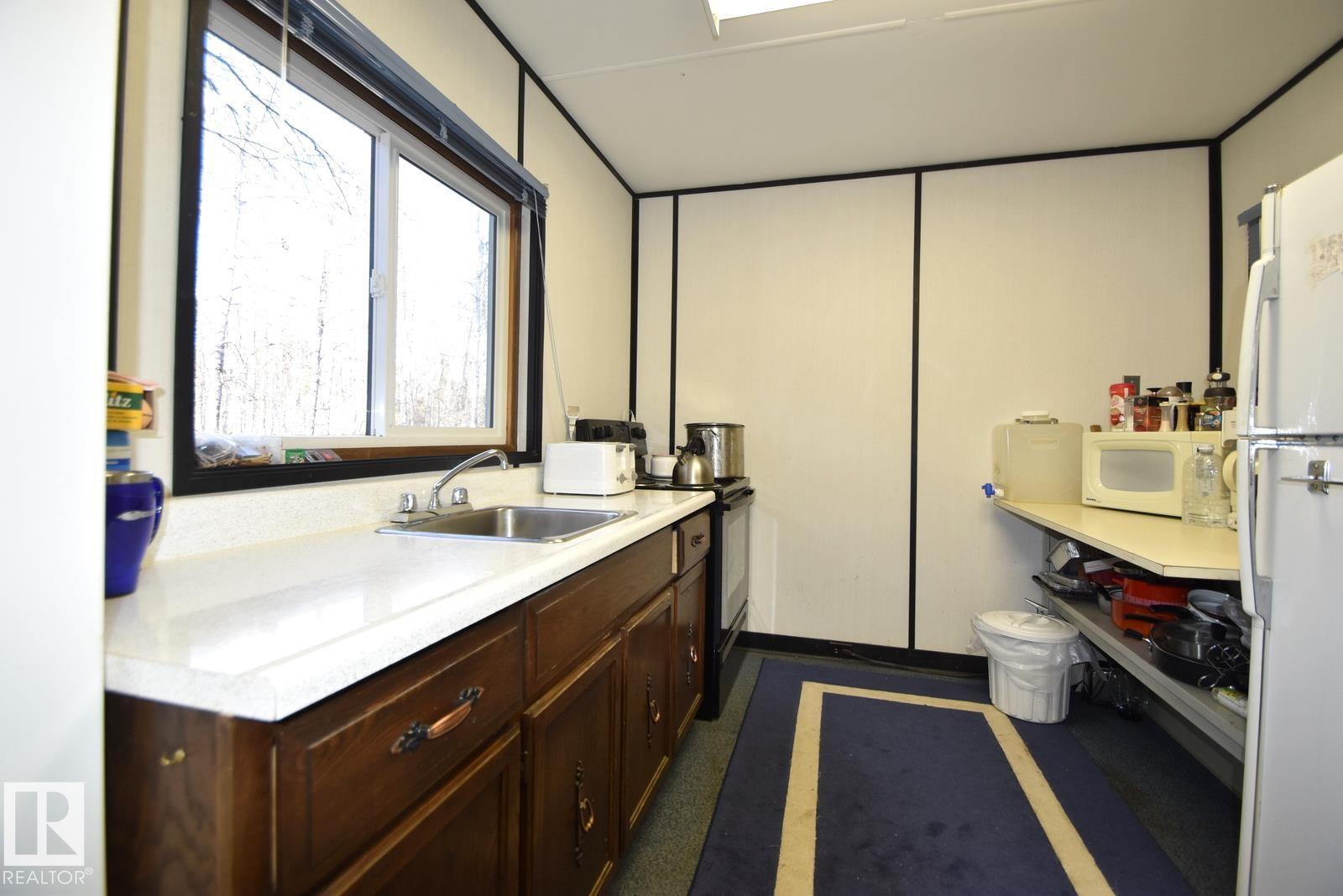 27, 174032 twp rd 653.7