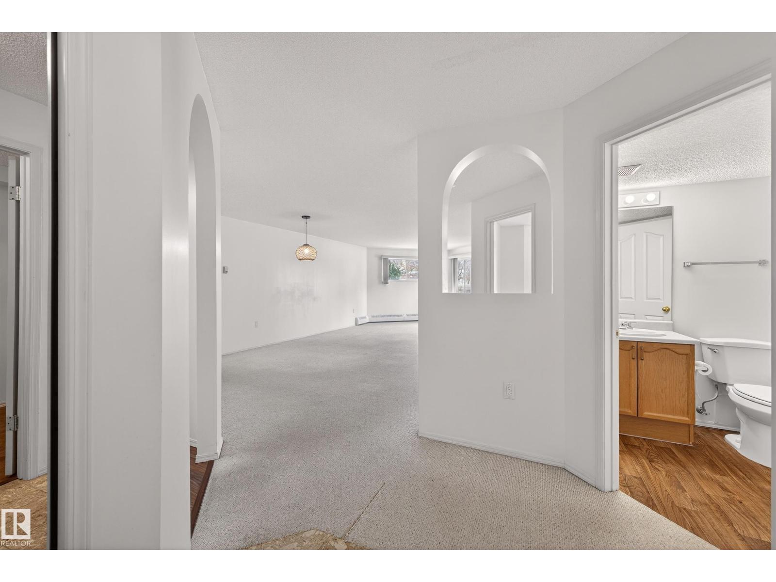 #106 15499 CASTLE DOWNS RD NW