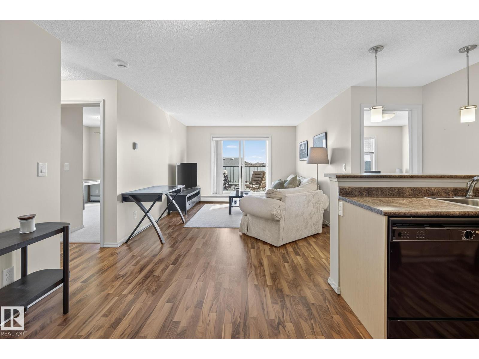 #310 6070 SCHONSEE WY NW