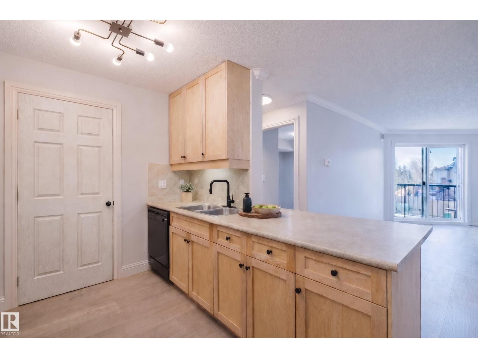 #209 14612 125 ST NW