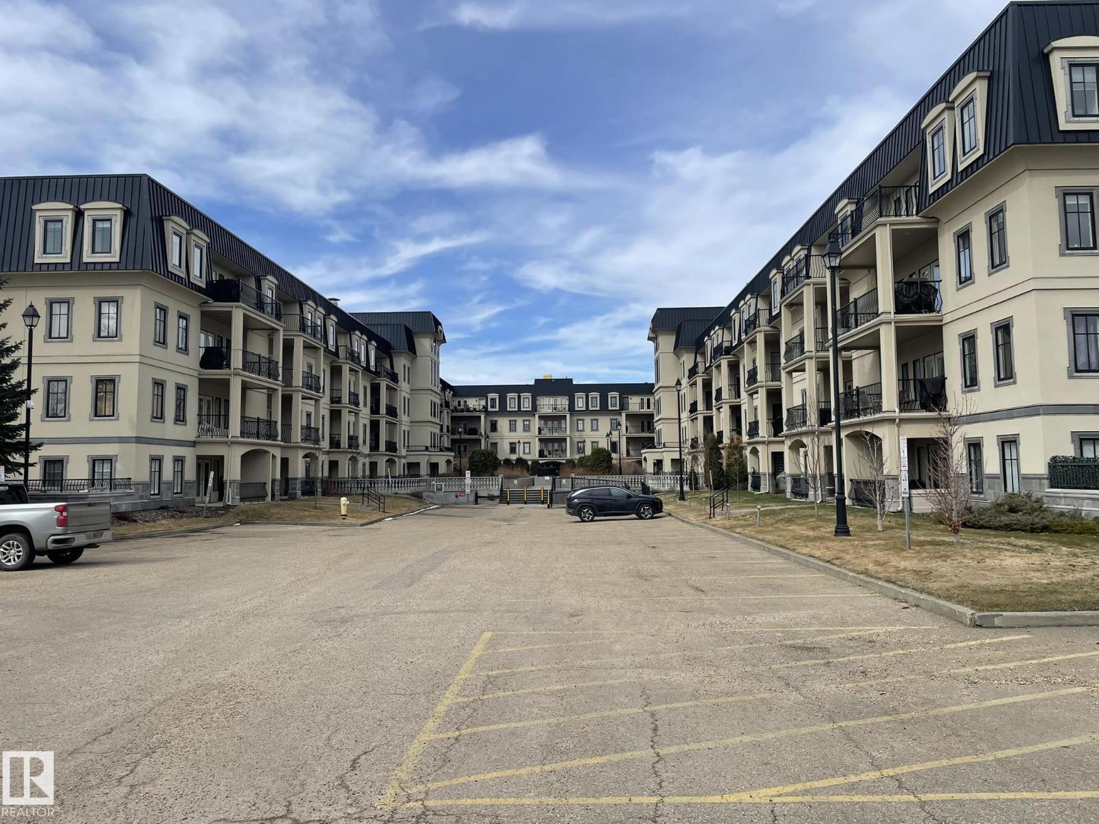#211 1406 HODGSON WY NW