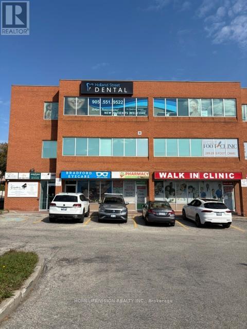 Photo 1 of 8 — 100F - 107 HOLLAND STREET Unit 100F, Bradford West Gwillimbury (Bradford), ON L9N1C3