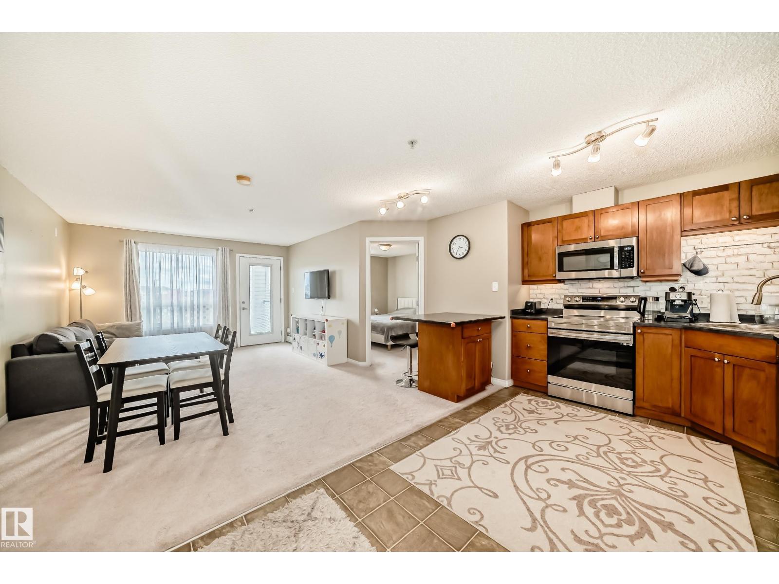 #1309 7339 SOUTH TERWILLEGAR DR NW