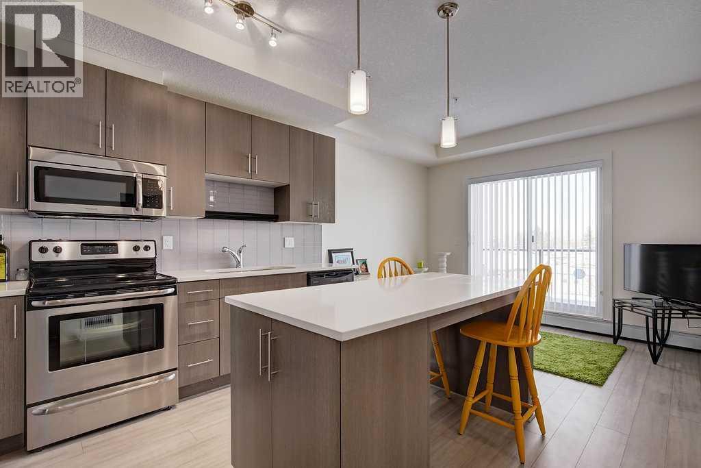 305, 15233 1 Street SE