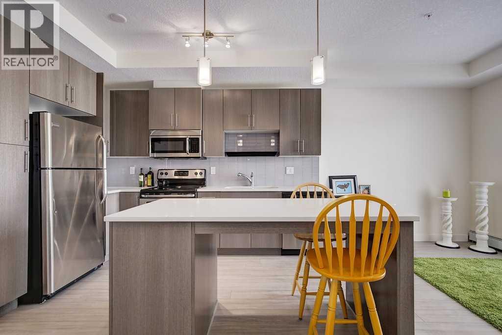 305, 15233 1 Street SE