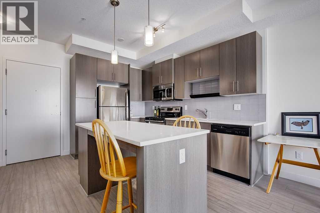 305, 15233 1 Street SE