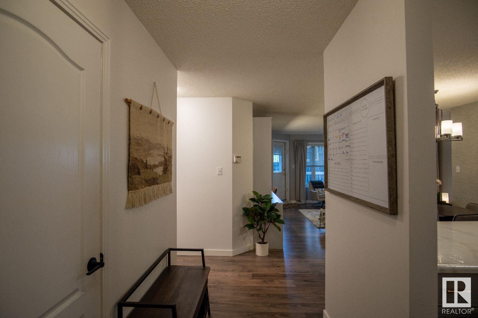 #104 8909 100 ST NW