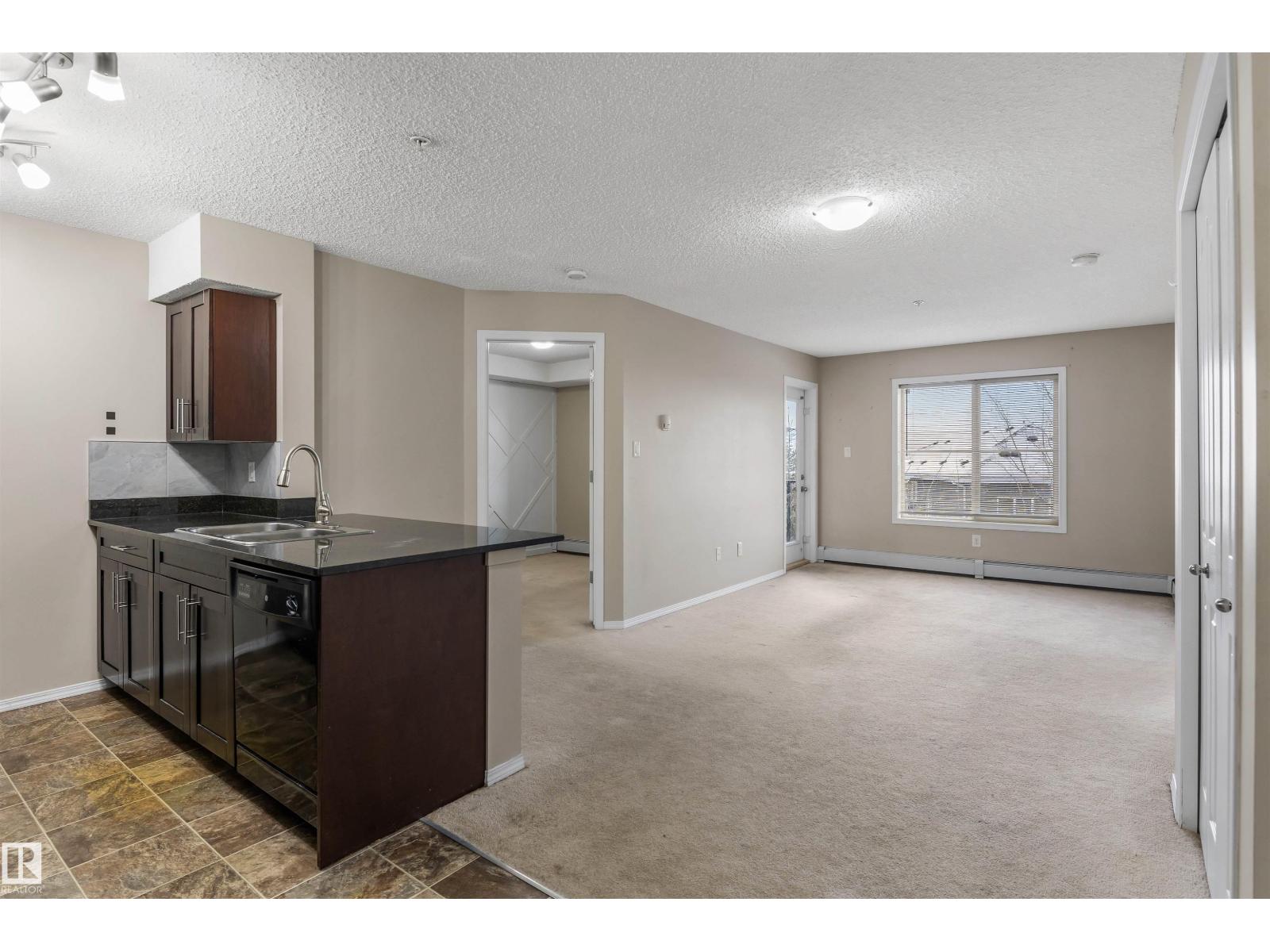 #312 1060 MCCONACHIE BV NW