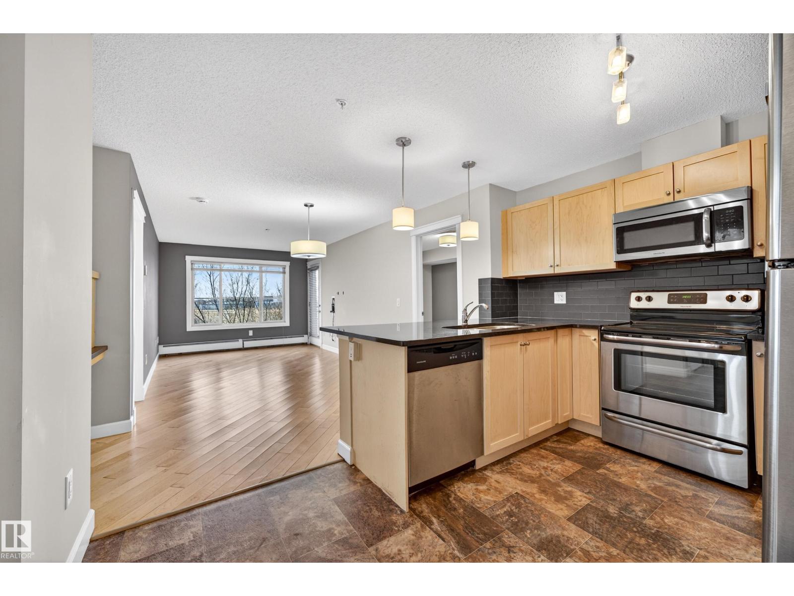 #310 3719 WHITELAW LN NW