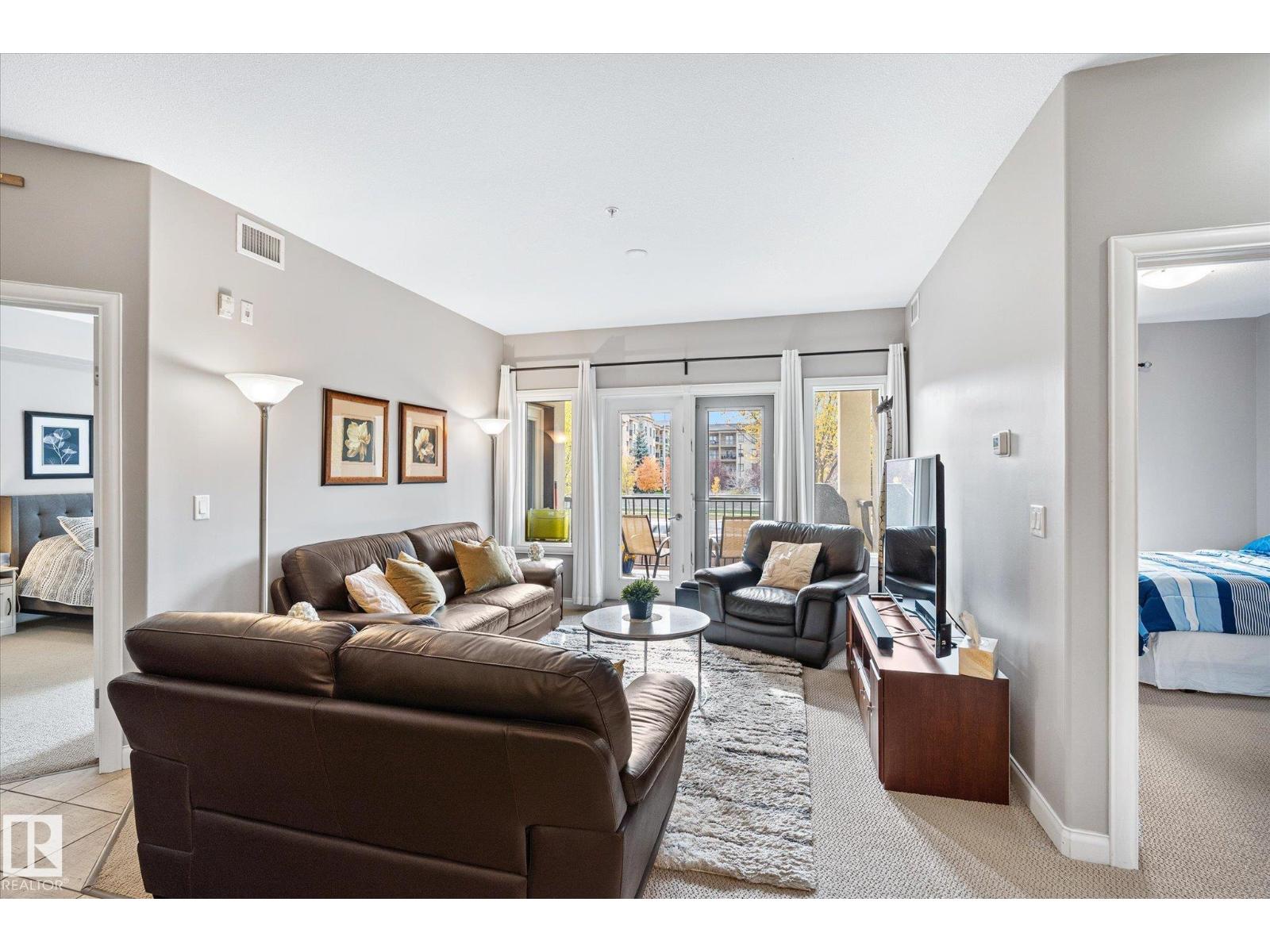 #213 1406 HODGSON WY NW