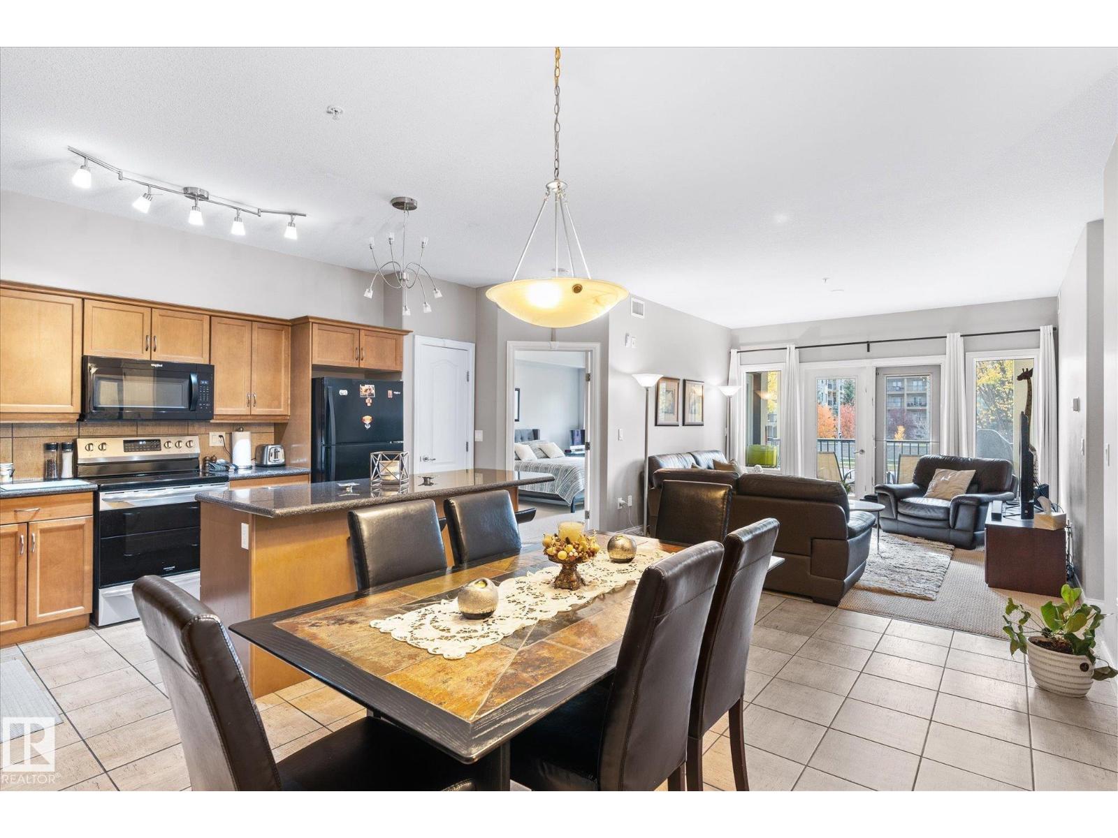 #213 1406 HODGSON WY NW