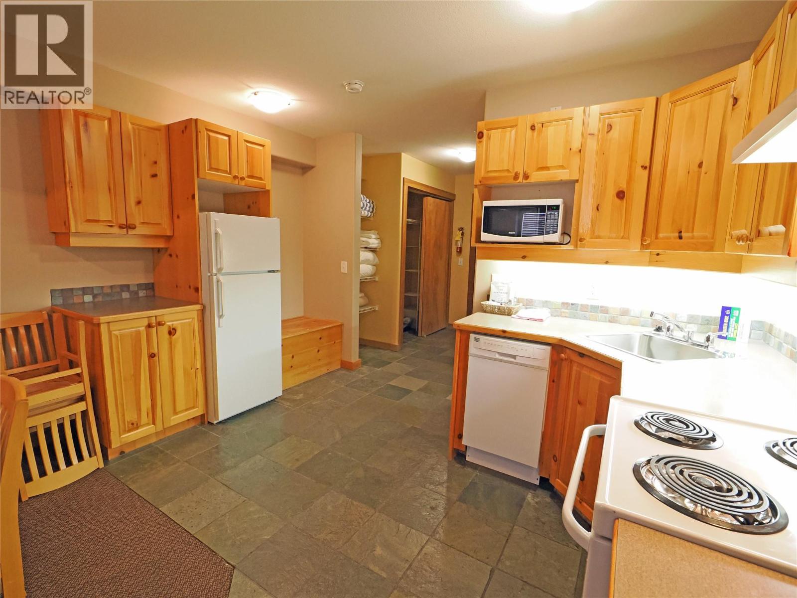 5335 Big White Road Unit# 303/305