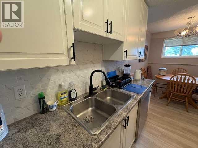 703, 11620 Elbow Drive SW