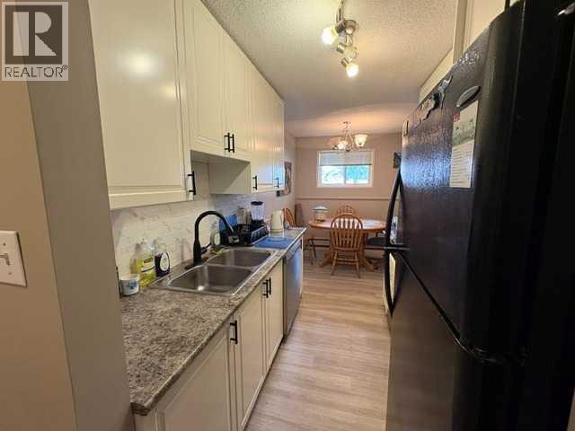 703, 11620 Elbow Drive SW