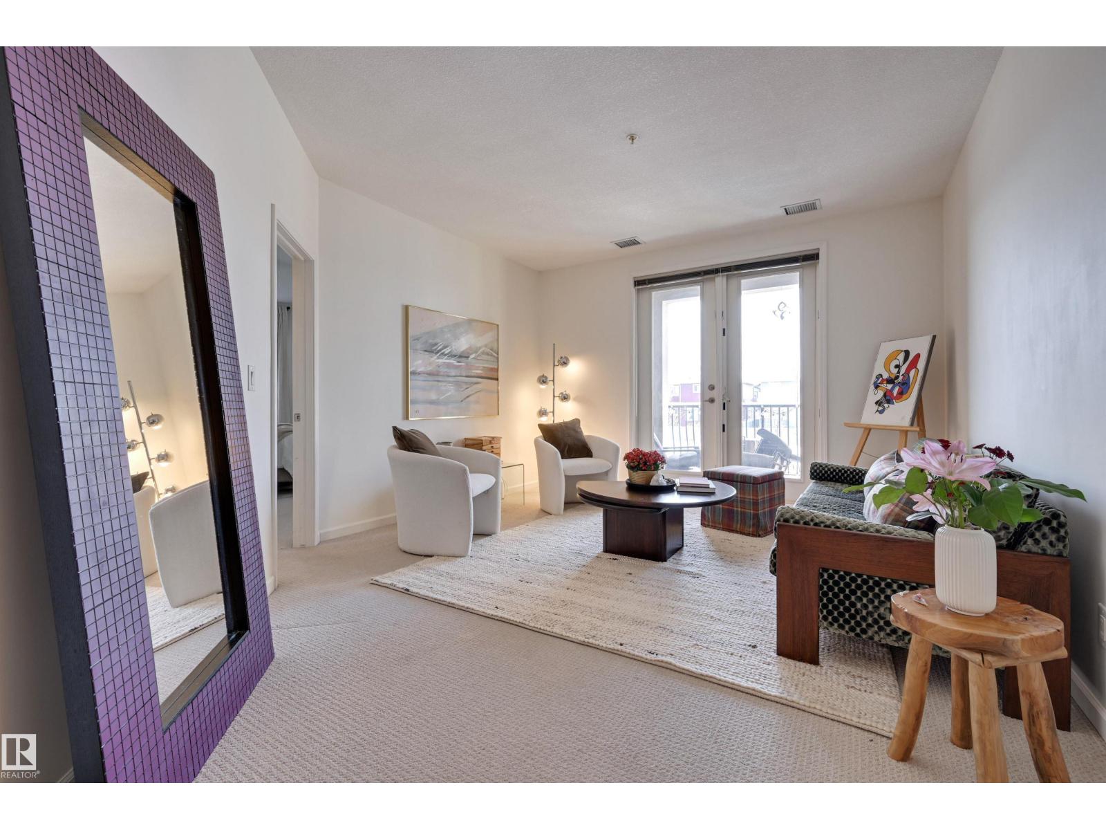 #221 6083 Maynard WY NW