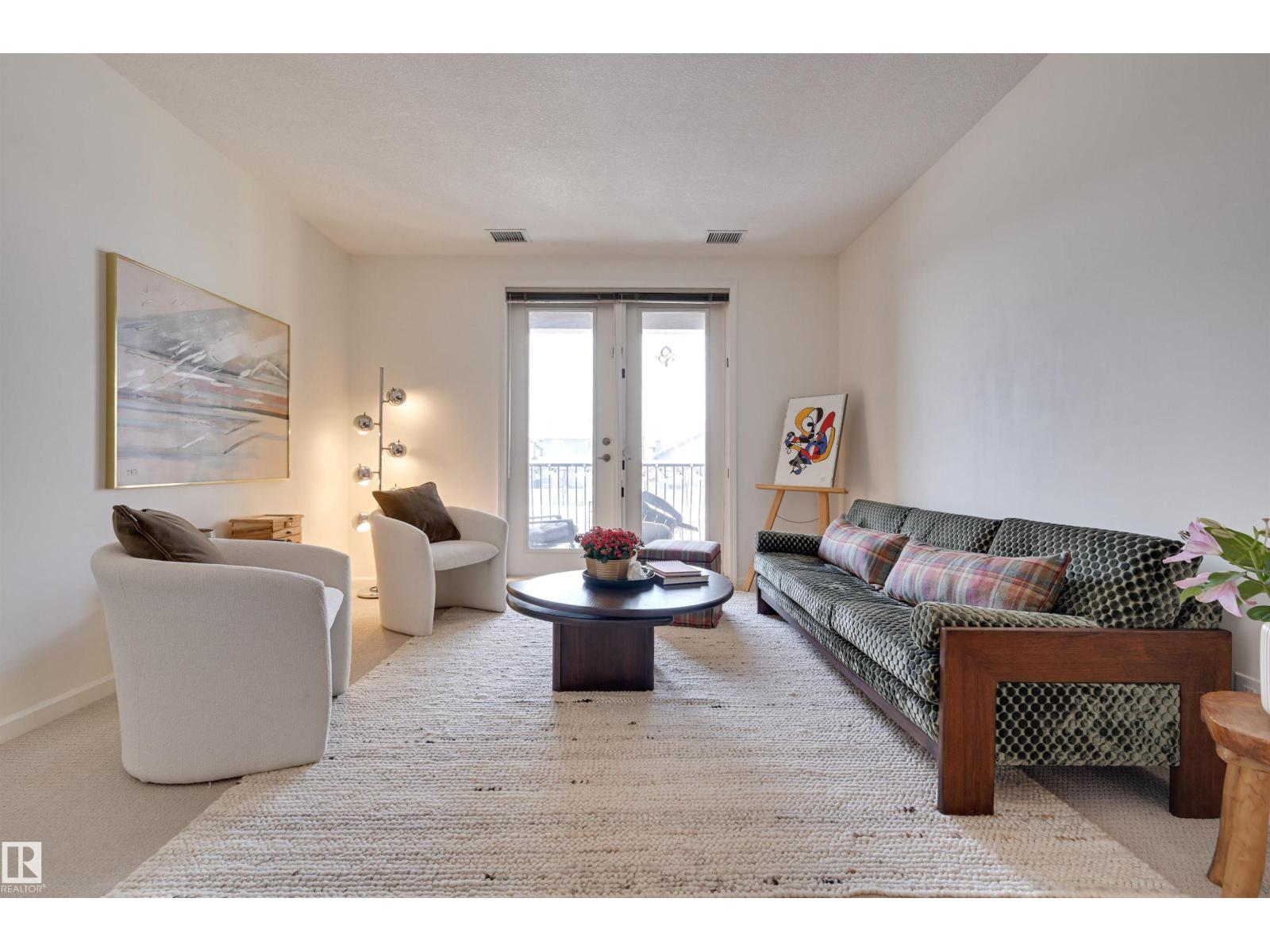 #221 6083 Maynard WY NW