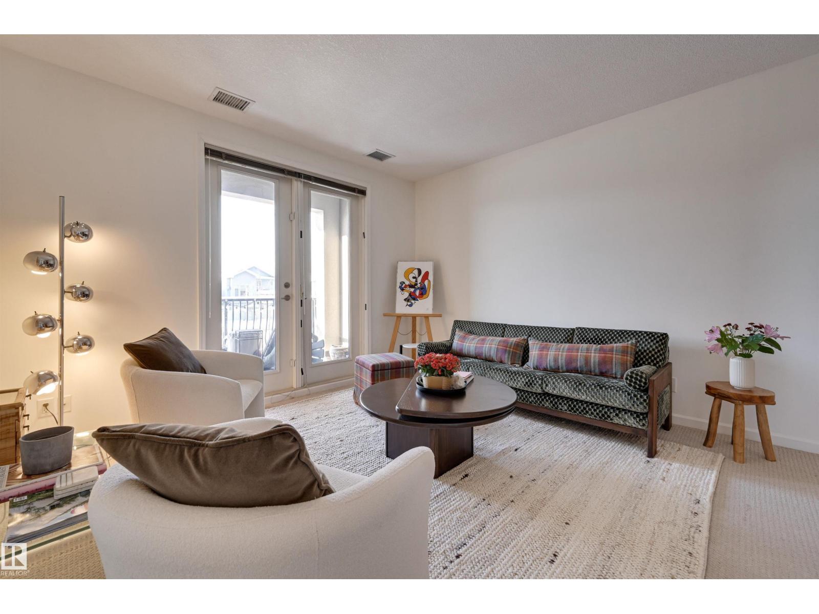 #221 6083 Maynard WY NW