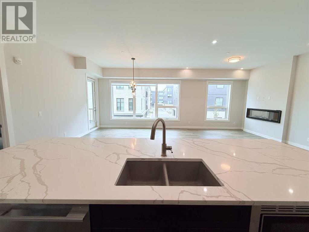 202, 235 Lebel Crescent NW
