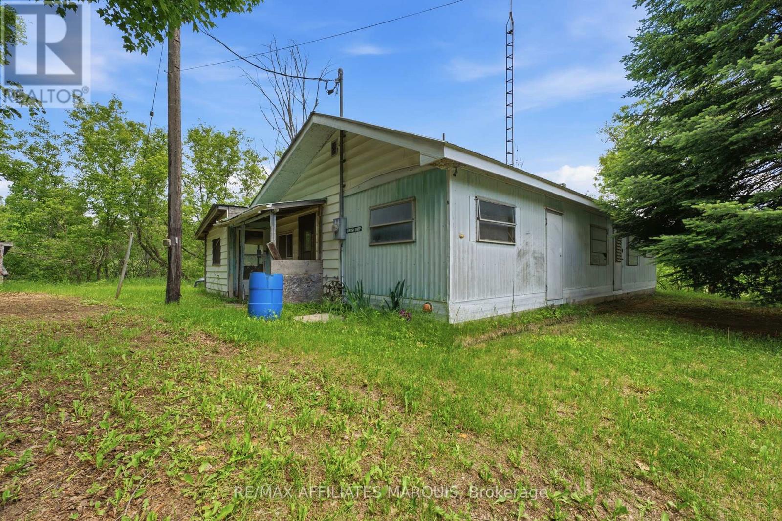 Photo 1 of 14 — 1195 THOMPSON ROAD, Frontenac (Frontenac Centre), ON K0H2E0