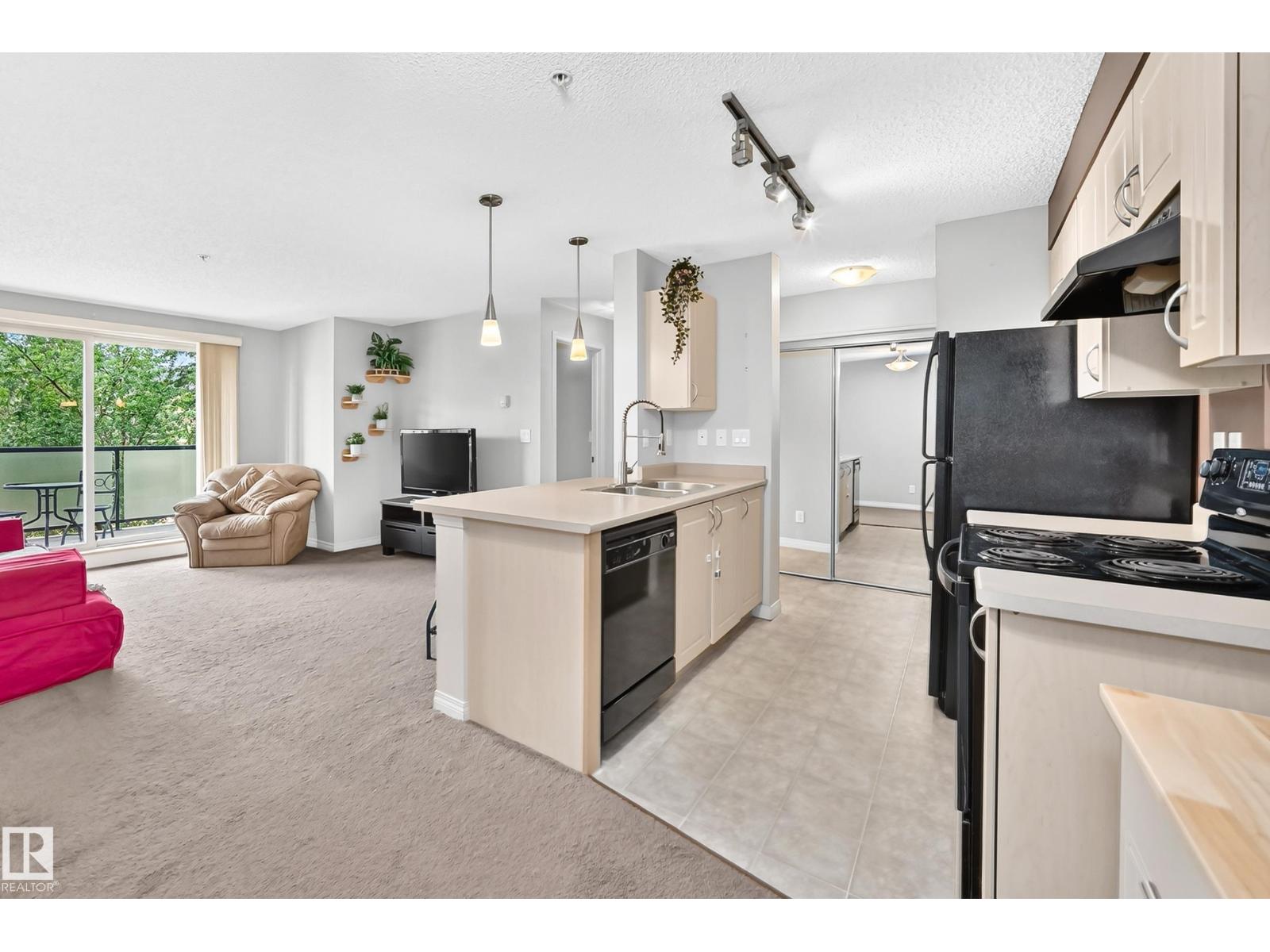 #218 13907 136 ST NW