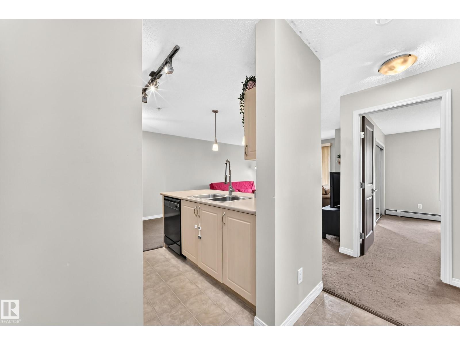 #218 13907 136 ST NW