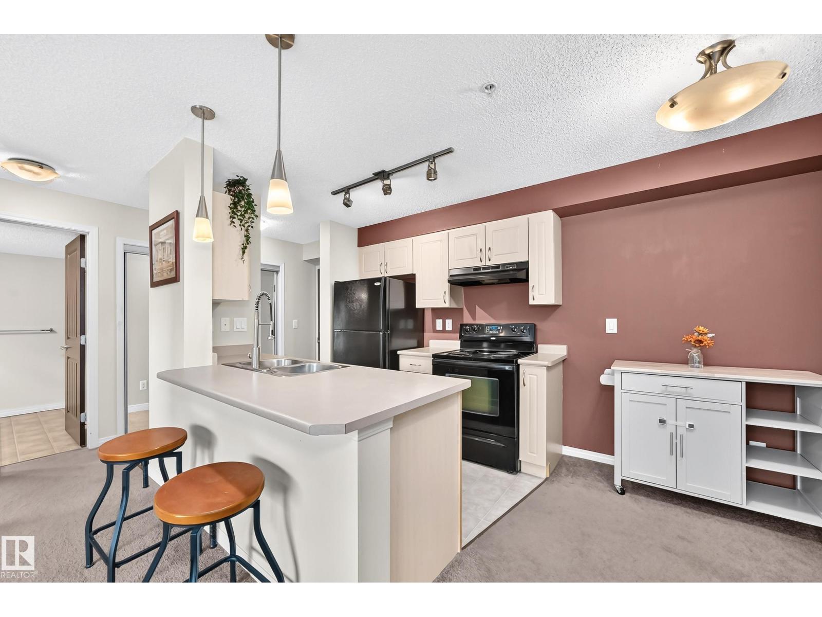 #218 13907 136 ST NW