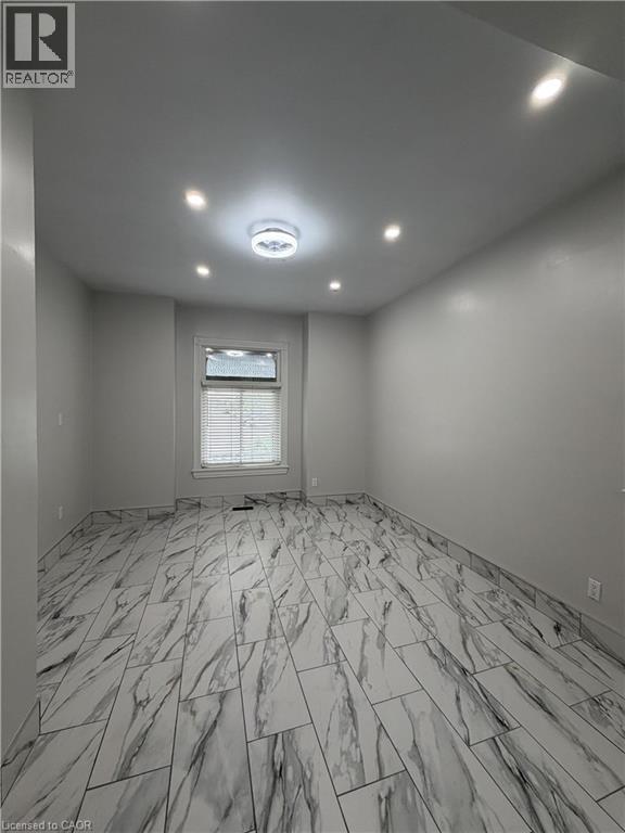 Photo 1 of 13 — 169 WENTWORTH Street N Unit# 1, Hamilton, ON L8L5V6