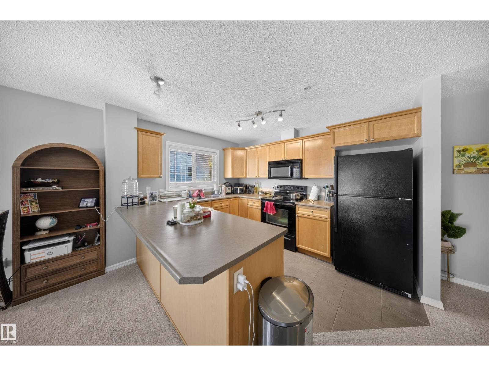 #215 4403 23 ST NW