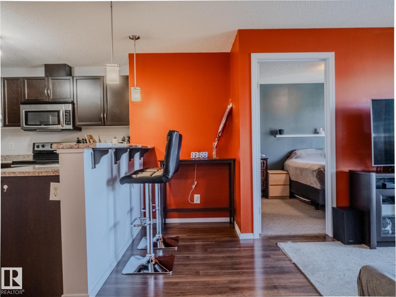 #409 6070 SCHONSEE WY NW