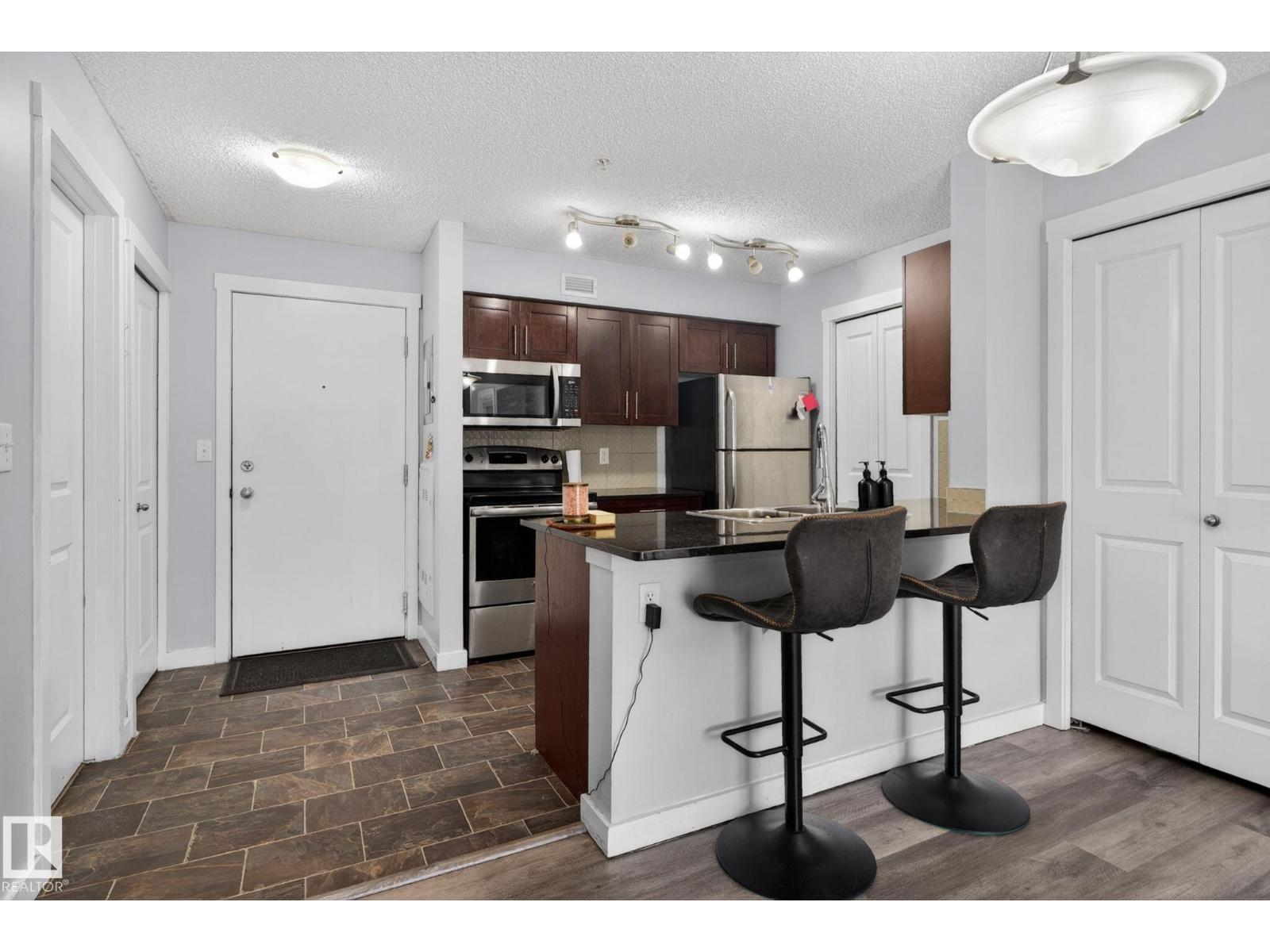 #318 5810 MULLEN PL NW