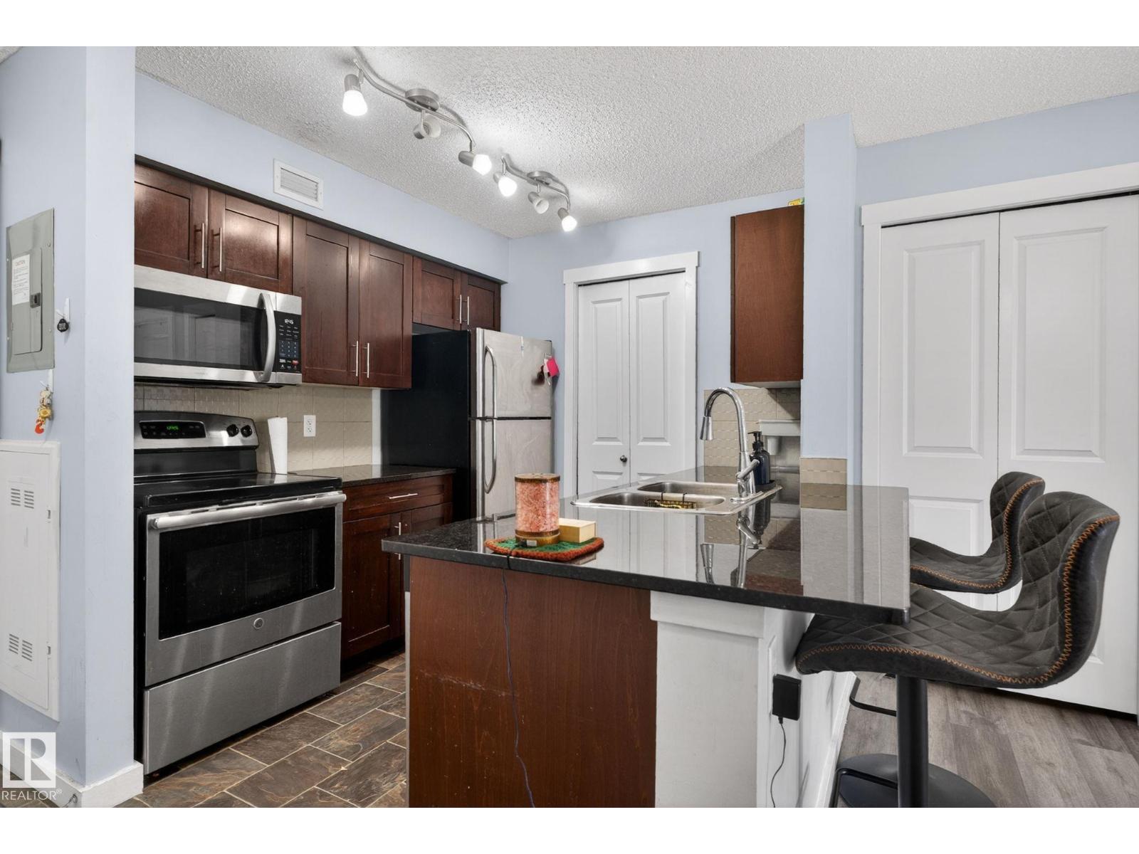 #318 5810 MULLEN PL NW