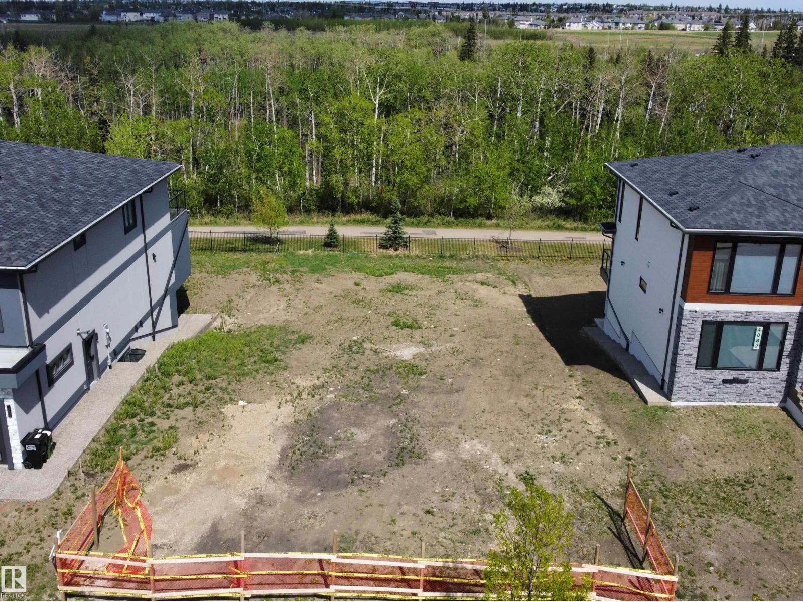 4091 WHISPERING RIVER DR NW