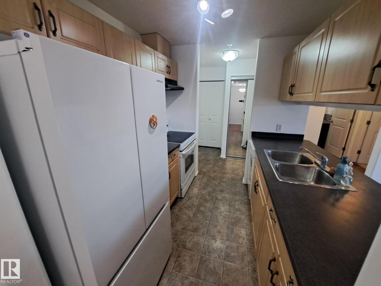 #205 9910 107 ST